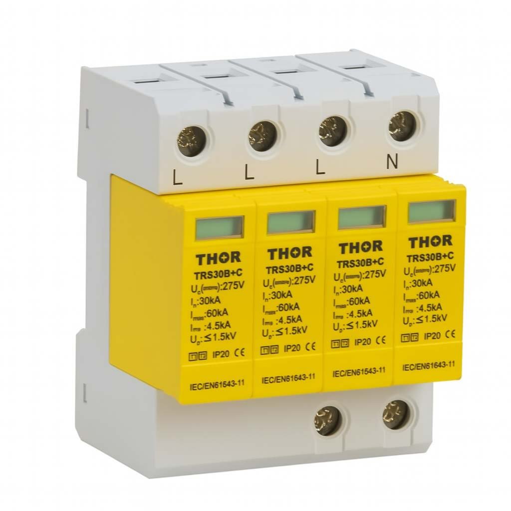 Four-channel surge protection device (SPD) with yellow modules labeled THOR TRS30B+C, mounted on a white DIN rail base with L and N terminal markings